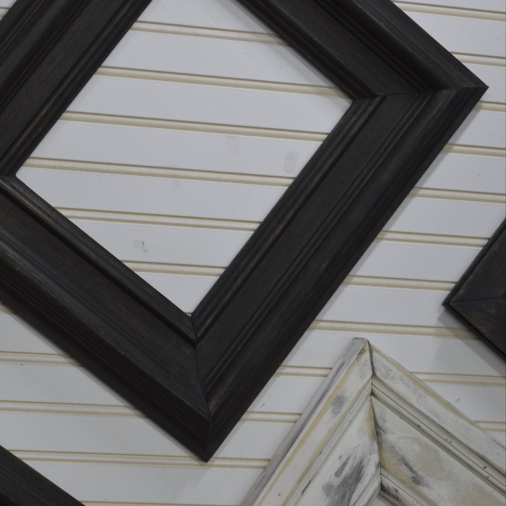 Collection of various picture frames on a striped background