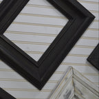Collection of various picture frames on a striped background