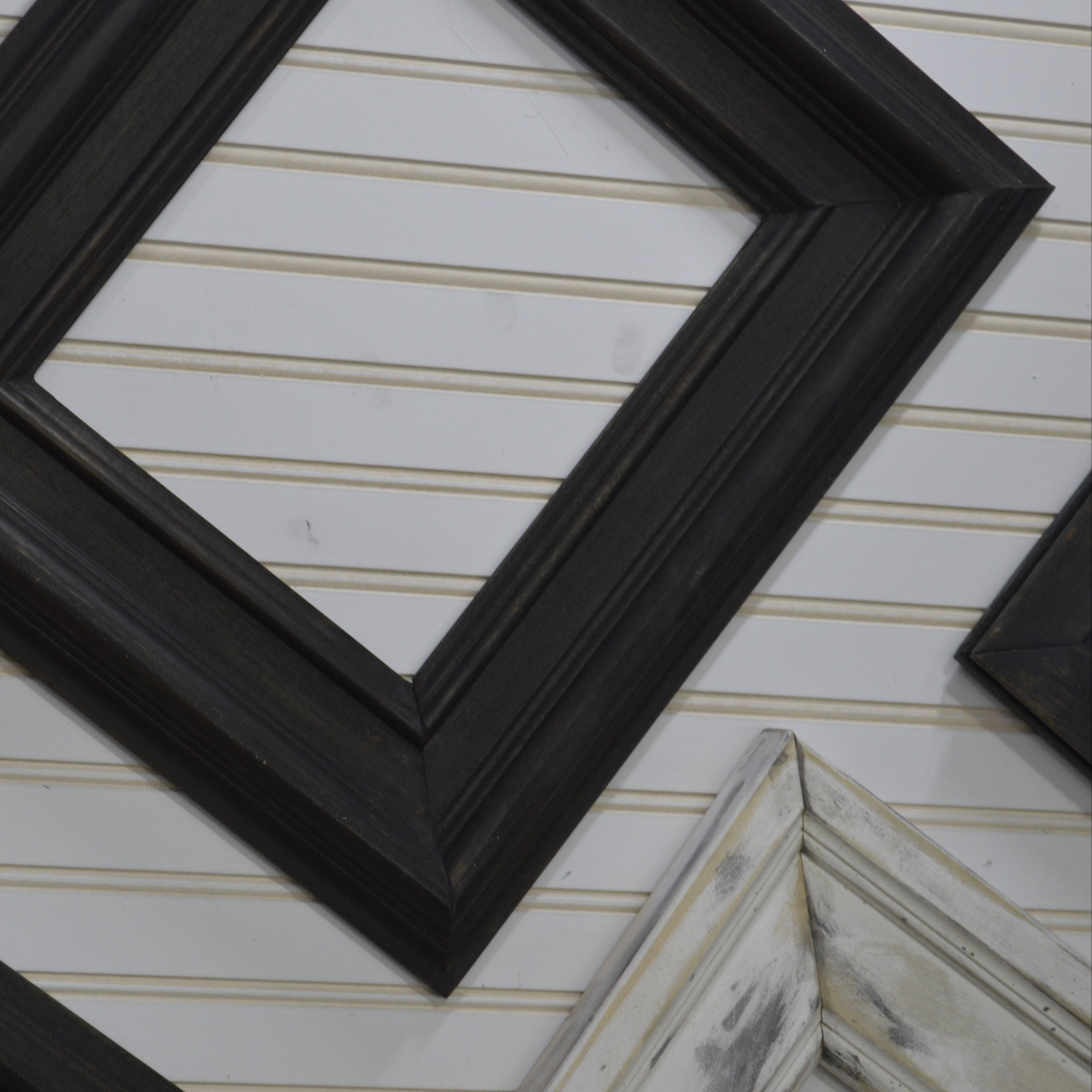 Collection of various picture frames on a striped background